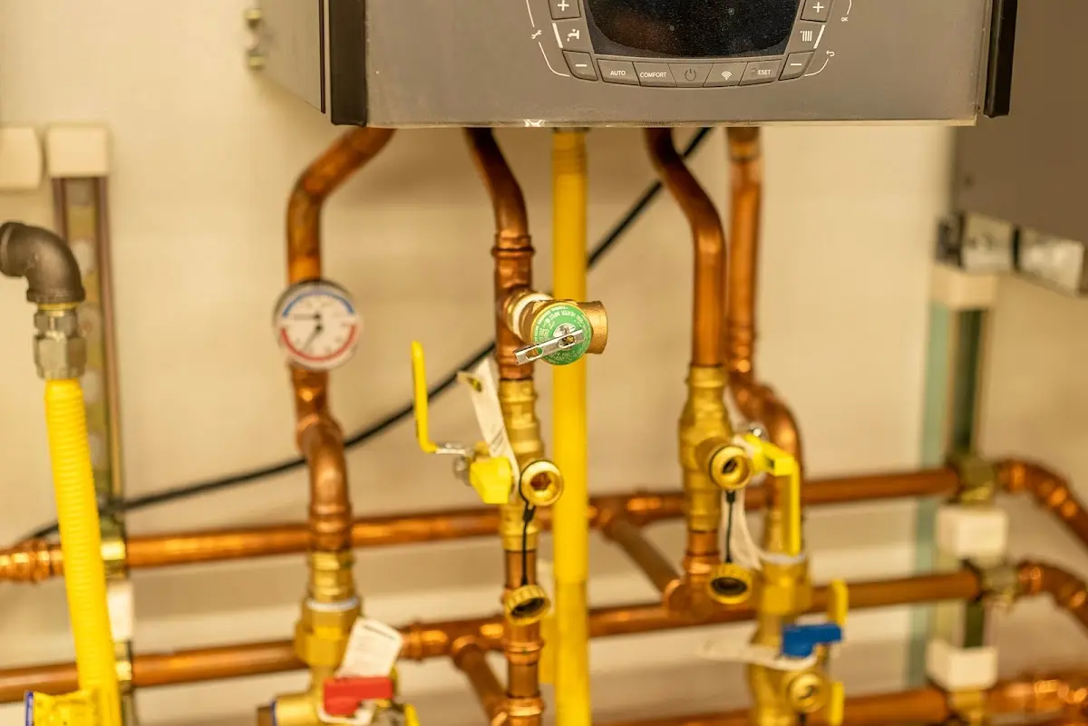 Licensed technician providing Water Heater Installation for a homeowner in Genesee